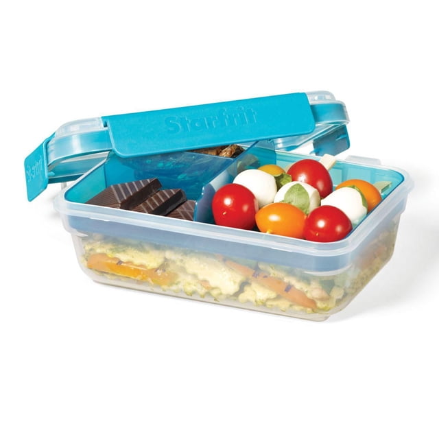 Starfrit Easy Lunch Rectangular Bento Container with 32oz capacity and removable divided tray, featuring a blue airtight, leakproof 4-sided locking lid. The clear BPA-free polypropylene container holds pasta in the main section, with chocolate and cherry tomato mozzarella skewers separated in the tray. Microwave, freezer, and dishwasher safe, it is also suitable for organized meal prep and portion control.