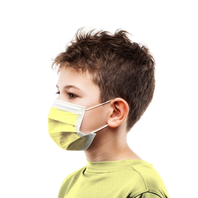 A child wearing a CanadaMasq ASTM Level 3 Medical Procedure Face Mask designed for kids. The mask is disposable, made in Canada, and features a 3-layer construction for high filtration efficiency and comfort. It includes a secure nose bridge and soft ear loops for a snug fit. The mask dimensions are 5.75” x 3.75” (14.5 x 9.5 cm), and it is latex, graphene-free, and hypoallergenic. Sold in a box of 50 masks.