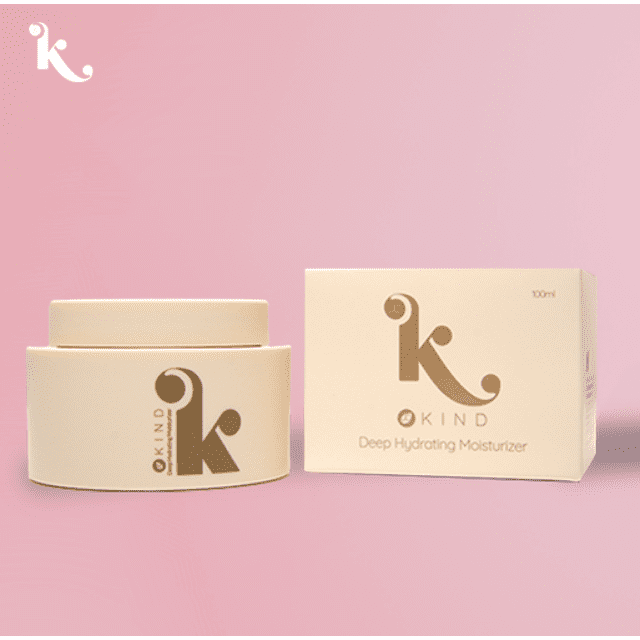 Kind Deep Hydrating Moisturizer 100ml, featuring a cream jar and matching box with gold branding on a soft pink background. This face moisturizer is enriched with antioxidants, vitamins, and plant extracts to hydrate and soothe dry, tired skin, promoting a soft, smooth, and youthful glow.
