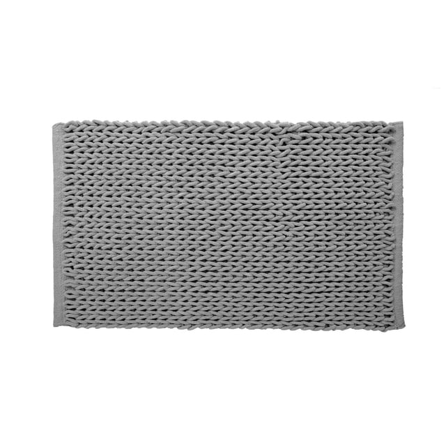 MODA BRAIDED MARBLE GREY BATH RUG 20x32" is a rectangular grey bath rug with a braided texture made of 60% micro polyester and 40% cotton, providing a soft, comfortable surface suitable for bathroom and spa-like environments.