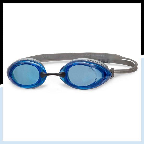 Dolfino Pro Launch Adult Swim Goggle in blue and silver with honeycomb-molded silicone eye cups to reduce pressure, tinted blue anti-fog lenses with UV protection, adjustable split grey head strap, and three nose bridge sizes for a custom fit, suitable for adult swimming and water sports.