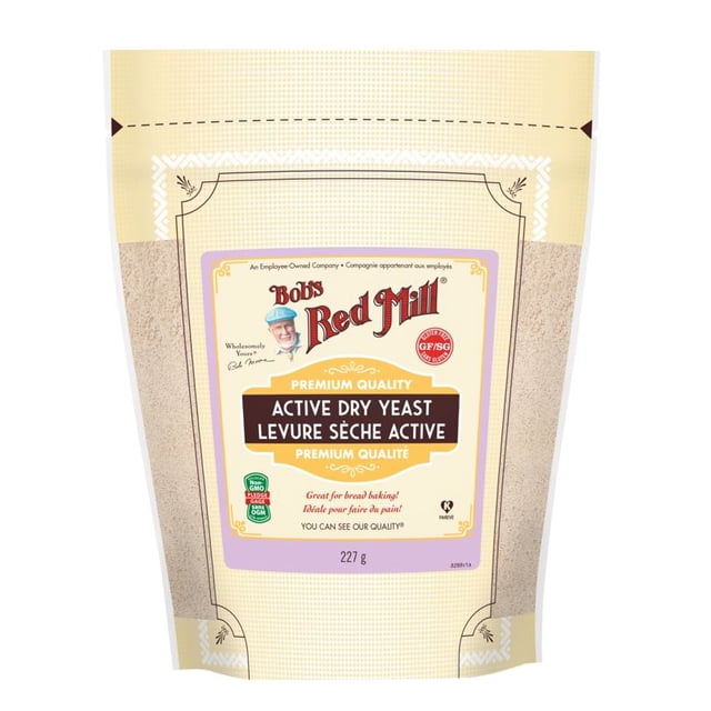 Bob's Red Mill Active Dry Yeast 227 g beige resealable pouch with premium quality gluten-free yeast, non-GMO certified, ideal for bread baking and various yeasted baked goods, featuring bilingual English and French text.