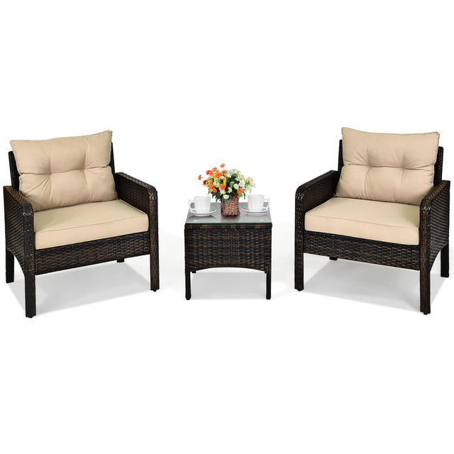 Costway 3PCS Outdoor Rattan Conversation Set Patio Garden Furniture Cushioned Sofa Chair. The set includes two brown PE rattan chairs with beige cushions and a matching coffee table with a tempered glass top. Designed for outdoor use, it features a sturdy steel frame, ergonomic armrests, and anti-skid foot pads. Ideal for patios, balconies, or poolside settings.