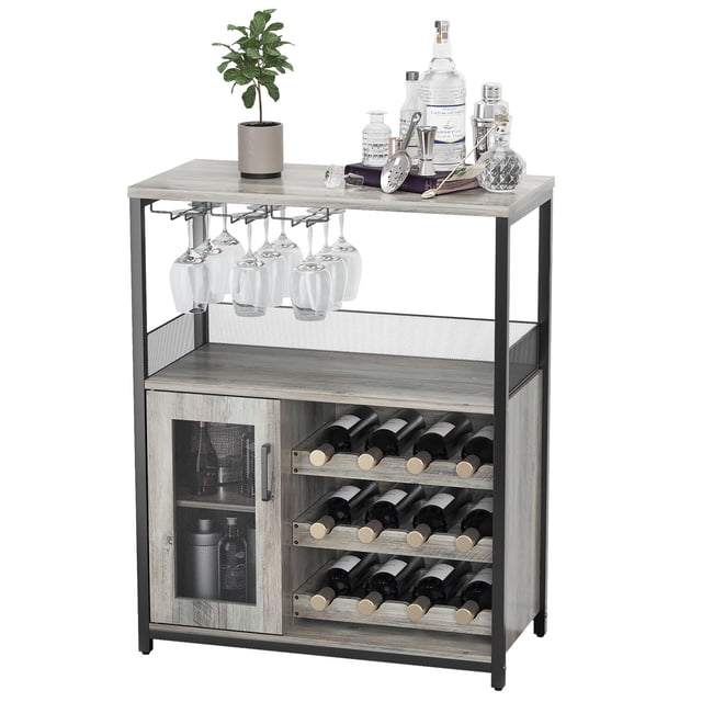 Twister.CK 5 Tier Wine Bar Cabinet in gray with a detachable wine rack and glass holder. The cabinet features a built-in rack for up to 12 wine bottles, a hanging glass holder for 9 stemware glasses, and a storage cabinet with a mesh door. Made of sturdy MDF with durable iron legs, it includes adjustable support legs for stability on uneven floors. The top surface is styled with bar accessories and a small potted plant, making it ideal for kitchens, dining rooms, or home bars.