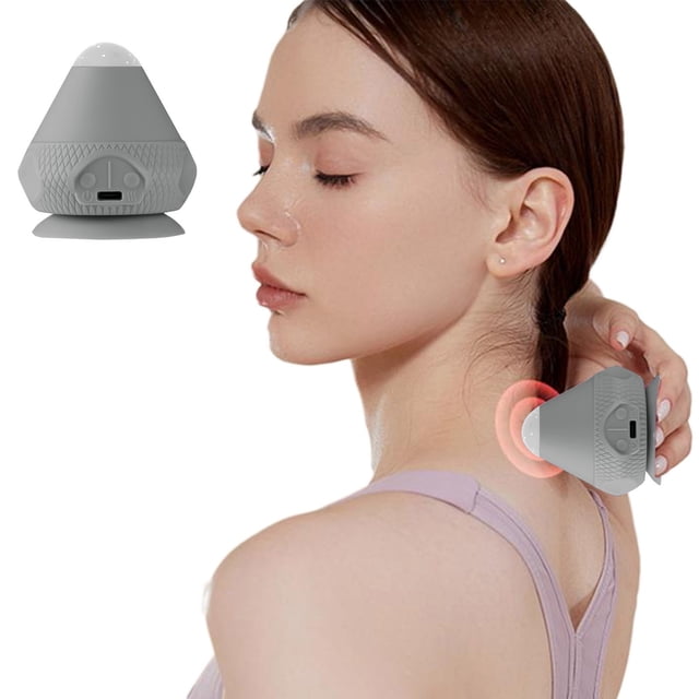 FHBVT Back Neck Shoulder Massage Ball for myofascial release and muscle knot relief, shown in gray with a unique suction cup design for mounting on walls. The compact 7x7x7cm tool is made of food-grade TPE and silicone, suitable for self-targeted pressure relief on the back, neck, shoulders, feet, or legs. The image also depicts a person using the massage ball on their neck, highlighting its ergonomic design and ease of use in various settings like home, office, or gym.