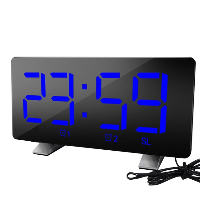 Réveil de Table Numérique Radio FM Mode Répétition Chambre d'Hôtel à Affichage LED avec Port USB, Doté d'Un design Élégant en Plastique Noir avec un Grand Écran LED Bleu. l'Horloge Comprend Deux Réglages d'Alarme, une Luminosité Réglable et un Mode Répétition pour un Temps de Sommeil Supplémentaire. Elle Dispose Aussi d'Un Port USB pour Charger des Appareils et d'Une Radio FM Intégrée Prenant en Charge des Fréquences de 76-108 MHz. la Taille Compacte de 172x43.8x91mm la Rend Adaptée à une Utilisation au Chevet Ou à l'Hôtel. Comprend