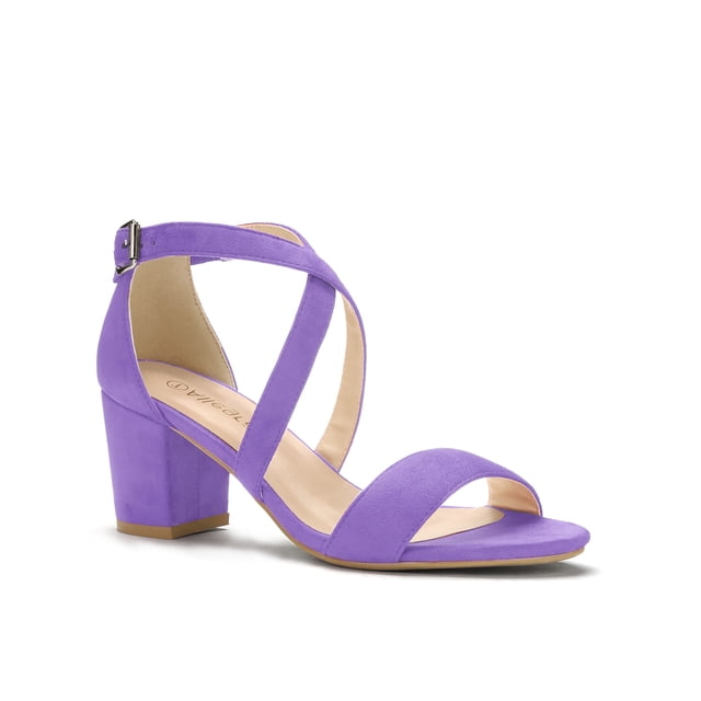 BLISSFUL STEP Women's Open Toe Cross Strap Mid Block Heel Sandals in purple, size 8. These sandals feature a faux suede vamp, a 2 1/2-inch block heel, and a rubber outsole for stability. The design includes crisscross straps at the ankle with an adjustable buckle closure for a secure fit. The padded insole ensures comfort, while the non-slip outsole enhances safety. Suitable for casual outings, office wear, or evening events.