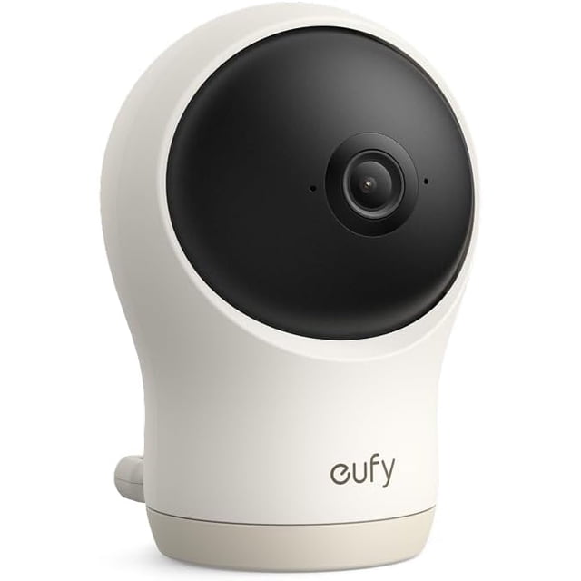 eufy C10 Baby Monitor Add-On Camera, 2K HD resolution, 4× zoom, 351° pan and 60° tilt — white plastic tabletop camera with front lens module and visible status LED, night-vision sensor noted in title, shown in a neutral indoor nursery setting suitable for infant monitoring; often used to share live Wi‑Fi feeds with family.