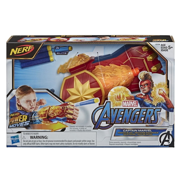 Marvel Avengers Captain Marvel Photon Blast Gauntlet in retail packaging showing a red and gold roleplay gauntlet with a star emblem, designed for kids 5 and up to launch NERF Elite foam darts, includes 3 darts and instructions from the NERF Power Moves series.
