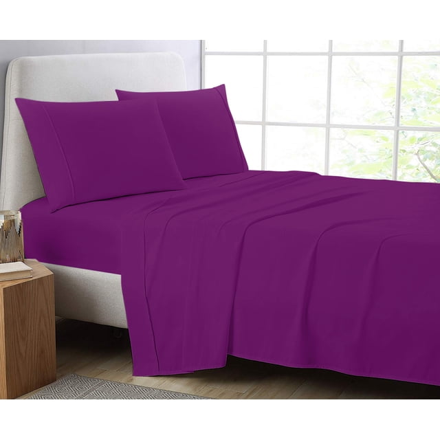 Cotton Metrics 4pc Sheet Set 600TC 100% Organic Cotton in a vibrant purple color displayed on a bed. Includes a fitted sheet, flat sheet, and two pillowcases. Made from ethically sourced organic cotton with a 600 thread count for luxurious comfort. Ideal for bedding sets, fitted sheets, and pillowcases. Suitable for all seasons and easy to care for with machine wash compatibility.