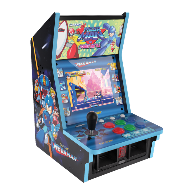 Evercade Alpha Mega Man Bartop Arcade avec un Écran IPS Haute Résolution de 8 Pouces Affichant le Jeu Mega Man, joystick de Qualité Compétition et six Boutons d'Arcade Colorés. l'Unité Bartop Compacte Comprend des Boutons de Démarrage et de Sélection, le Contrôle du volume et des ports USB pour le Multijoueur local. l'Oeuvre Officielle Capcom Mega Man Décore les Panneaux Latéraux et le Chapiteau Lumineux, Idéale pour les Amateurs d'Arcade Classique et de Jeux Rétro.