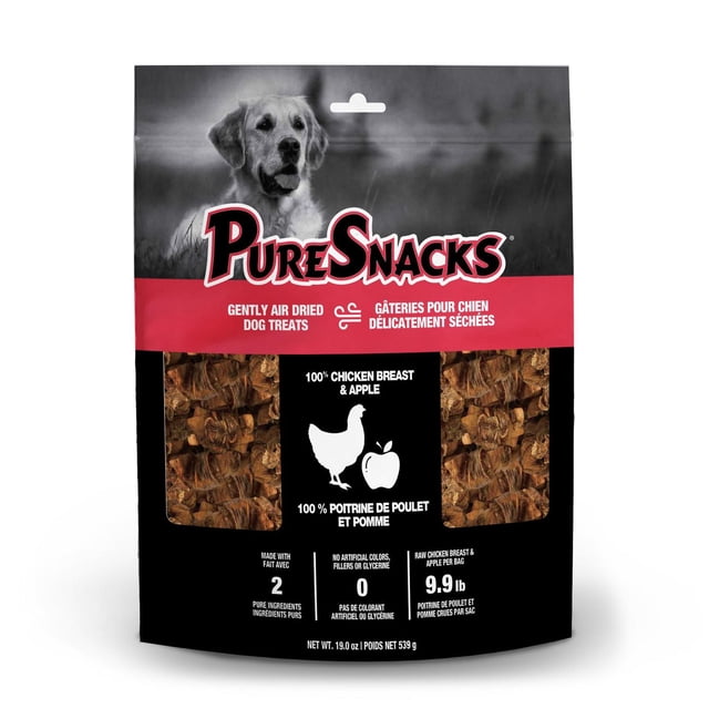 PureSnacks Chicken & Apple Jerky Dog Treats in a resealable black and red bag featuring gently air dried, limited ingredient dog treats made from 100% chicken breast and apple, with clear bilingual labeling and a golden retriever image.