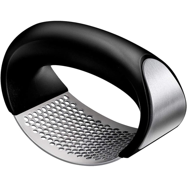 Garlic Press Tainless Garlic Press with a stainless steel rocker design, ideal for pressing garlic efficiently. Features dense holes for fine garlic output, an ergonomic non-slip handle for comfort, and durable rust-resistant material. Easy to clean under tap water or in a dishwasher, making it a versatile kitchen utensil.