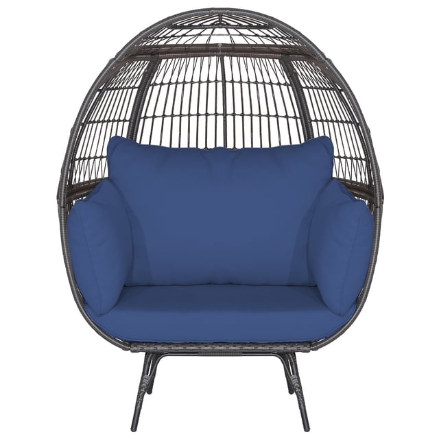 Gymax Patio Rattan Wicker Lounge Chair Oversized Outdoor Metal Frame Egg Chair with 4 navy cushions. Features a mix brown hand-woven PE rattan design, spacious seating area measuring 43'' x 32.5'' x 57'' (L x W x H), and a sturdy X-shaped metal frame. Suitable for indoor and outdoor use.
