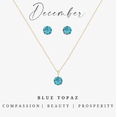 thumbnail image 1 of Goldtone December Blue Topaz Birthstone CZ Earring & Necklace Set, 1 of 2