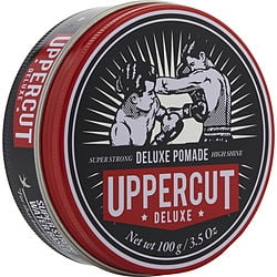 Uppercut Deluxe Deluxe Deluxe Pomade , 3,5 Onces, Emballées dans une Boîte Métallique Ronde avec une illustration vintage de Boxe sur le Couvercle. le design Présente une Marque Rouge et Blanche Audacieuse avec un Texte Mettant en Valeur « Super Fort », « Pomade » et « Haute Brillance. » Idéal pour la Coiffure et l'Atteinte d'Un Style Soigné.