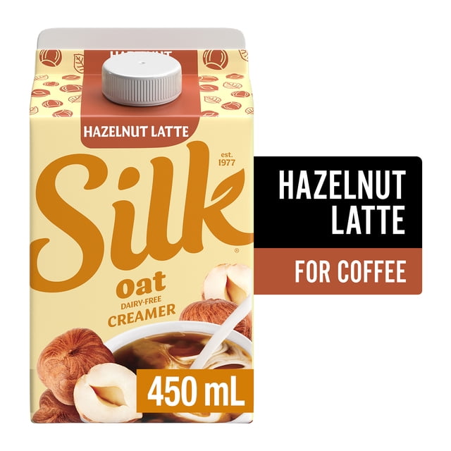 Silk Crème à Café à l'Avoine Latte aux Noisettes 450 ml carton avec Emballage beige et Brun Présentant des images de Noisette et un Bouchon à Vis Blanc, Crème Sans Produits Laitiers Non Laitière Convenant à Rehausser la Saveur et la texture du Café.
