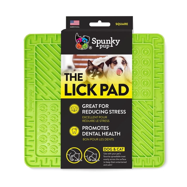 Lick Pads Dog Toy for Dogs by Spunky Pup, a square green non-toxic TPR rubber treat-spreader with textured grooves designed to reduce stress and promote dental health in dogs and cats, dishwasher-safe and made in the USA with bilingual packaging.