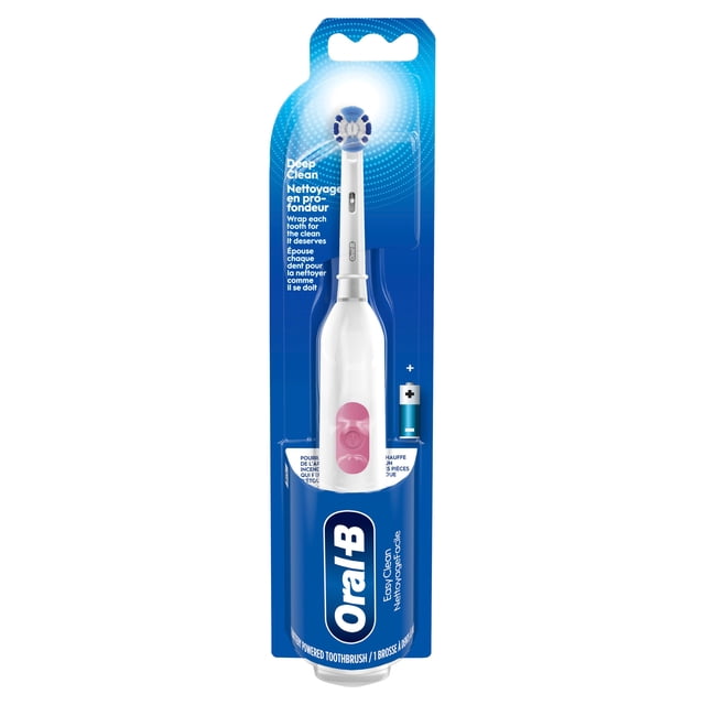 Oral B Easy Clean Battery Toothbrush in white with a dentist-inspired round brush head featuring blue and white X-shaped bristles, includes one AA battery, designed for deep plaque removal and oral care, suitable for travel and daily use.