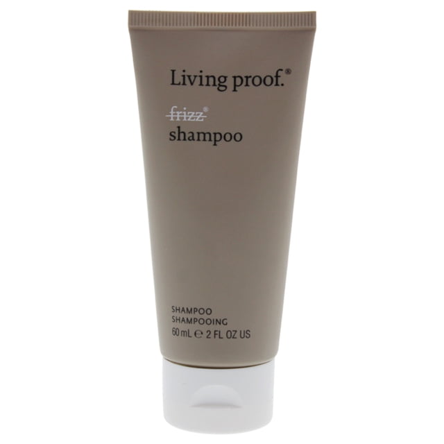 No Frizz Shampoo by Living Proof for Unisex in a 2 oz tube. The taupe-colored packaging features the Living Proof logo and product name in black and white text. Designed to gently cleanse hair while blocking humidity, it contains polyfluoroester for a sleek, frizz-free finish.