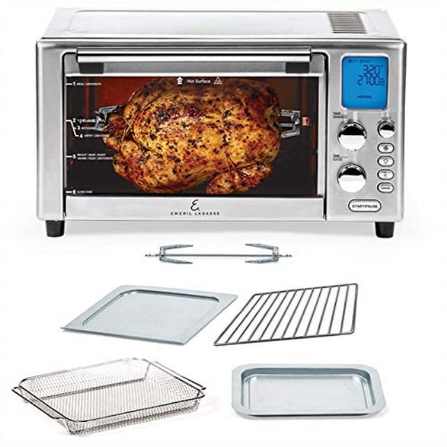 Emeril Lagasse Stainless Steel Power AirFryer 360 in silver, showcasing a rotisserie spit with a roasted chicken, digital display, and control knobs. Includes a baking tray, wire rack, crisper basket, and rotisserie tools for versatile cooking.