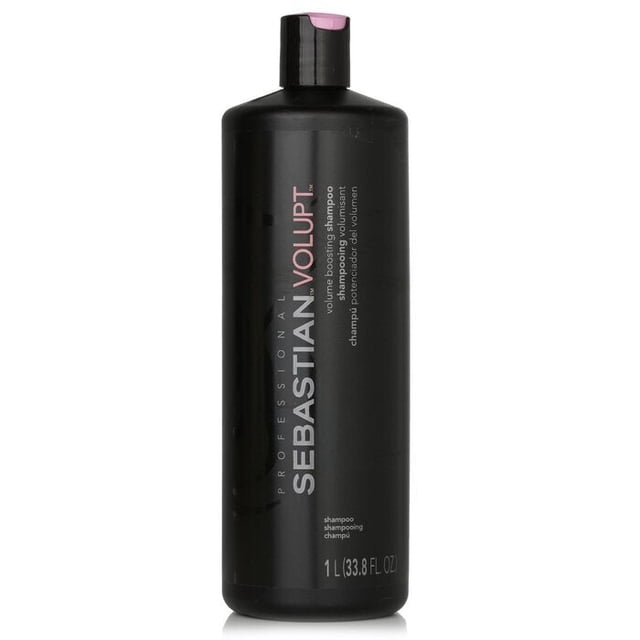 Sebastian Volupt Shampoo 1000ml/33.8oz in a sleek black bottle with pink and white text. This volumizing shampoo is formulated with cushioning particles and natural bamboo extract to provide a long-lasting volume boost and deep cleansing effect. Suitable for fine hair and colour-safe, it enhances hair's fullness and softness while supporting your wash and style routine.