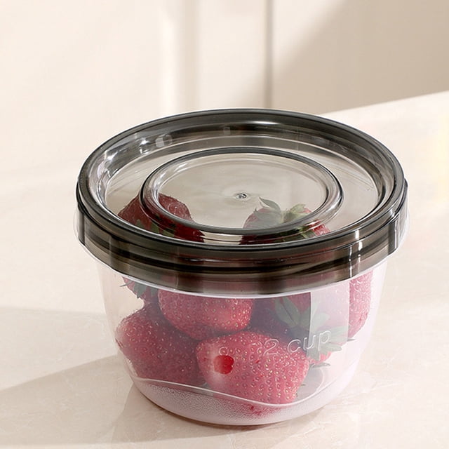 473ml Round Food Storage Containers with Lids - Leakproof microwave- and dishwasher-safe black plastic round container, front-facing view of a single 473 ml (11×8×8 cm) circular tub with screw-style lid; clear body showing empty interior, stackable rim and smooth sides on neutral background. Suitable for soup and meal prep storage in refrigerator and freezer, often used for lunches; also suitable for portioned meal prep.