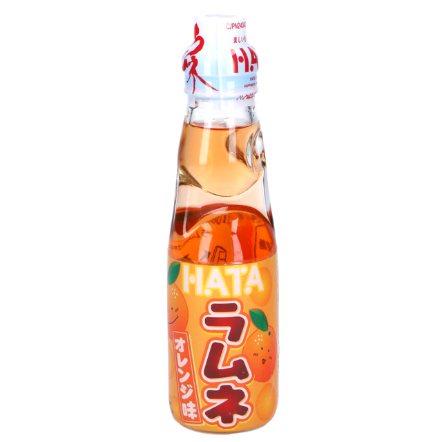 HATA Soda Orange in a clear glass bottle with a classic Japanese marble seal cap, containing orange-flavored ramune soda. The label features bright orange fruit illustrations and Japanese text, highlighting its refreshing citrus taste and traditional Japanese soda style.