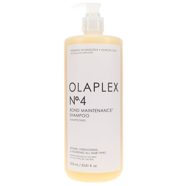 Olaplex No.4 Bond Maintenance Shampoo 33.8 oz bottle with pump dispenser, featuring a sleek design and white label with black text. Suitable for all hair types, this shampoo is free of sulfates, parabens, and phthalates, and works to repair, strengthen, and nourish damaged hair while reducing frizz and split ends.