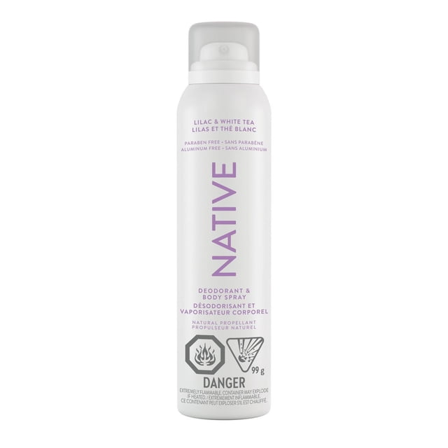 Native Aerosol-Free Spray Deodorant Lilac & White Tea in a white metal canister with clear cap and purple text, featuring natural propellant and flammable warnings, providing aluminum- and paraben-free, fast-drying deodorant spray for all-over body freshness.
