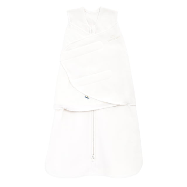 HALO® SleepSack® Swaddle - Fleece- Cream Newborn sleeveless fleece baby swaddle with adjustable 3-way wrap fasteners and bottom zipper for easy diaper changes, designed to replace loose blankets and ensure safe, comfortable sleep for newborns.