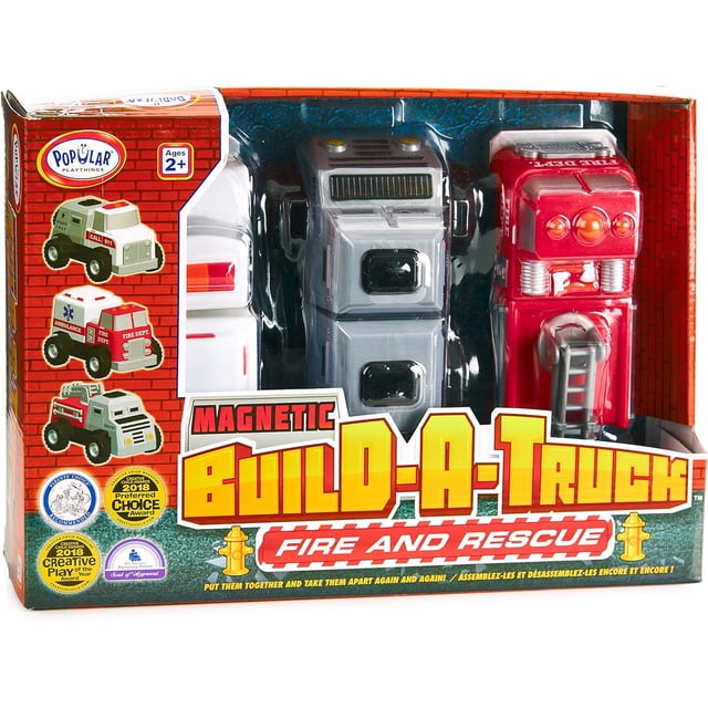 Popular Playthings Magnetic Build a Fire & Rescue Truck emergency vehicle toy for toddlers ages 2 and up. The packaging showcases three multicolored toy trucks, including a fire truck, ambulance, and rescue vehicle, with magnetic parts for easy assembly and rubber wheels for outdoor play. Ideal for children aged 2+, this STEM toy set encourages creativity and imaginative play, featuring six chunky pieces compatible with other sets.