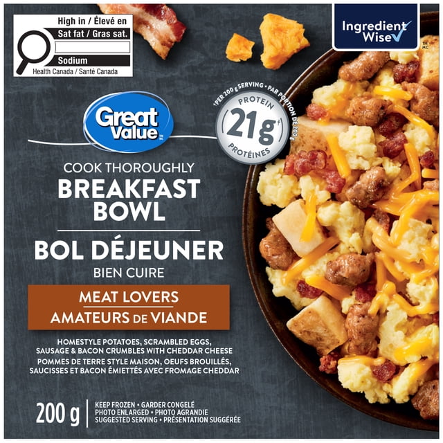Great Value Meat Lovers Breakfast Bowl with homestyle potatoes, scrambled eggs, sausage and bacon crumbles topped with cheddar cheese in a black bowl, offering 21 grams of protein per 200 g frozen breakfast serving, ideal for a quick high-protein meal.
