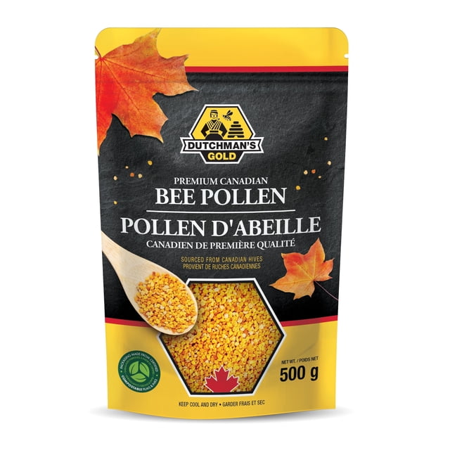 Premium Canadian Bee Pollen Granules 500 g by Dutchman's Gold. The resealable black and yellow package features a wooden spoon filled with vibrant yellow and orange bee pollen granules, a maple leaf design, and a compostable packaging logo. Ideal for adding antioxidants and minerals to your diet.