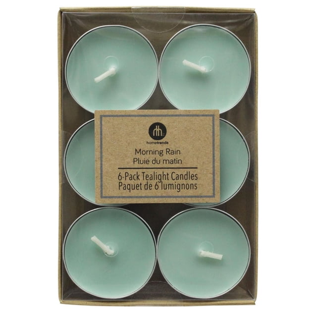 Hometrends Morning Rain Scented 6-Pack Tealight Candles with aqua wax and white cotton wicks in a clear plastic and cardboard box, providing ambient light and a refreshing rain water fragrance, suitable for indoor Christmas decorations and tabletop use.