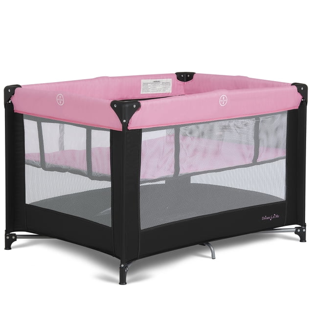 Dream On Me Zazzy Portable Play yard with Bassinet in pink and black, featuring mesh sides for 360-degree visibility, a removable infant bassinet, padded mattress, and easy fold design for compact travel and storage, suitable for infants and toddlers under 36 inches tall.