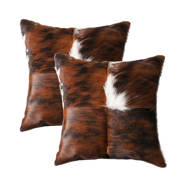 TORINO QUATTRO COWHIDE PILLOW 18"X18" 2-PACK with two hand-stitched square pillows made from 100% natural Indian cowhide in brown, black, and white patchwork, featuring hidden zipper closures and polyfil inserts, ideal for adding warmth to home décor and often used as stylish floor cushions.