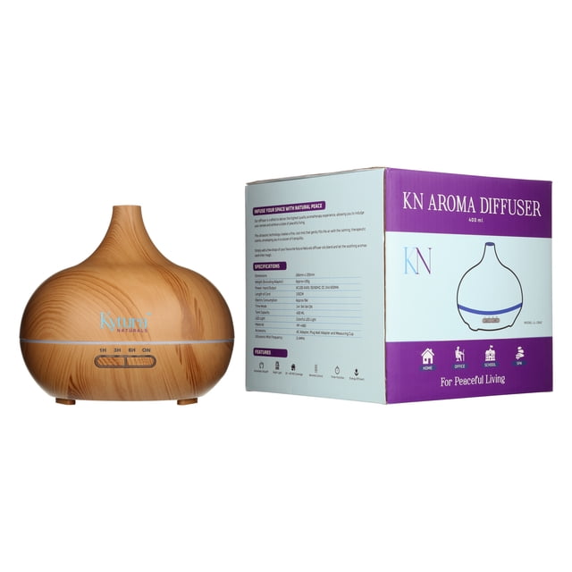 Kytura Naturals Aroma Diffuser 400 ML with a wood-grain finish and rounded design, shown next to its packaging. The diffuser uses advanced ultrasonic technology to release a cool mist, ideal for aromatherapy and relaxation. Features include auto shut-off, control buttons, and accessories like a remote control, measuring can, and user manual.