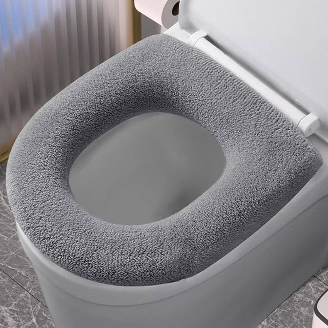 Soft Toilet Seat Cover Pad with Stretchable Washable Design for Enhanced Bathroom Comfort and Warmth. Made from polyester fiber, this multicolor cover features a soft fabric for a gentle seating experience. Its stretchable design ensures a secure fit on standard toilet seats, while the machine-washable material allows for easy cleaning. Ideal for adding warmth and comfort in colder seasons, it combines practicality and style for your bathroom.