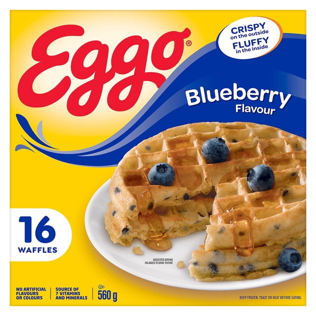 EGGO Blueberry Flavour Waffles, 560g (16 waffles) showing three light golden waffles with visible blueberries on a white plate, drizzled with syrup and topped with fresh blueberries, highlighting their crispy outside and fluffy inside texture, suitable for frozen breakfast and a source of essential nutrients.