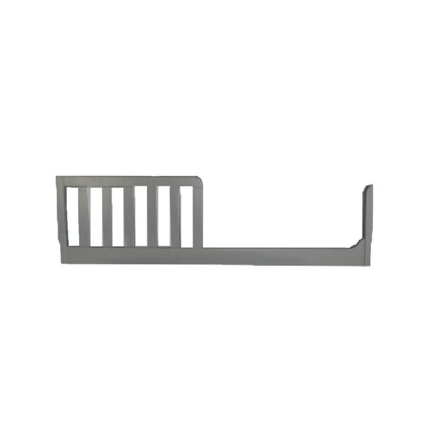 Concord Baby Toddler Guard Rail in grey solid wood with a non-toxic finish, designed as a safety barrier to prevent toddlers from falling out of bed, compatible with select Concord Baby cribs including Aria, Carson, and Cleo models, featuring vertical slats and a horizontal rail for toddler bed safety.