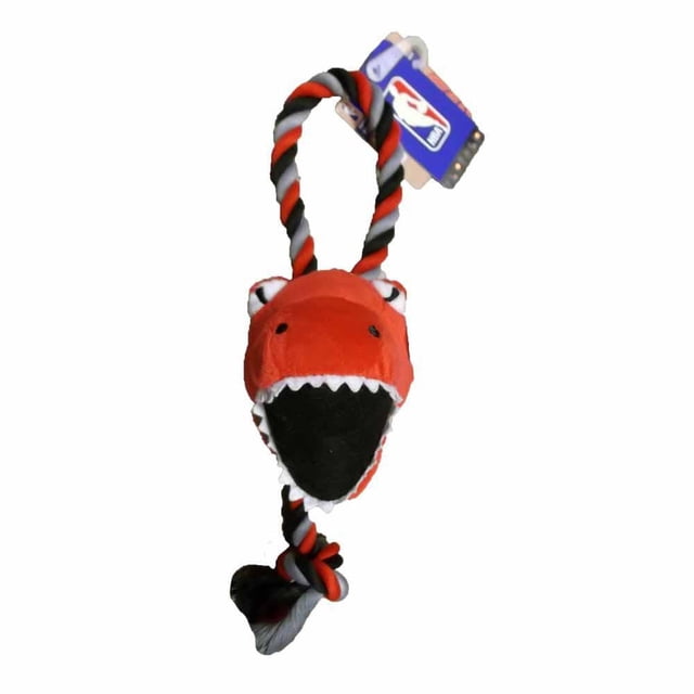 Silver Paw NBA Toronto Raptors Mascot Head dog chew toy featuring a red Velociraptor mascot head with white teeth and black mouth interior, attached to a twisted black, red, and gray rope loop with a knotted end, sized 9 inches, designed to keep dogs entertained while showing team spirit.
