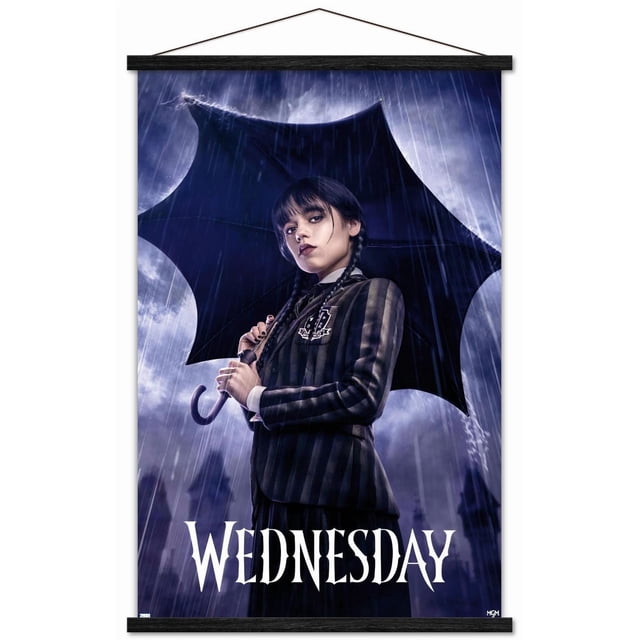 Wednesday - One Sheet Wall Poster, 22.375" x 34", depicting a figure in a dark striped blazer holding a bat-wing shaped black umbrella under heavy rain with a stormy sky and gothic architecture silhouettes, with 'WEDNESDAY' in white gothic font at the bottom, ideal for bedroom or office wall decor.