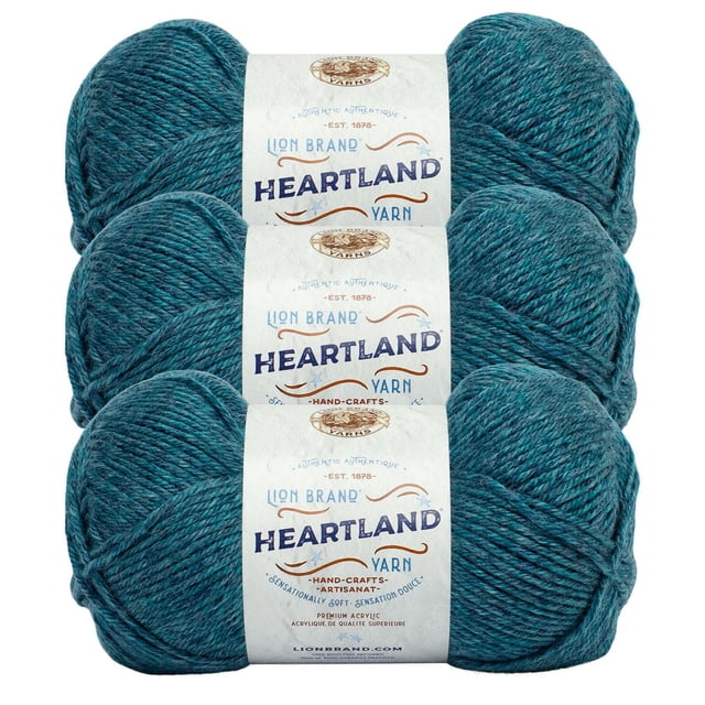 Lion Brand Yarn Heartland Yarn 3Pack with three skeins of medium worsted weight acrylic yarn in heathered teal, each wrapped in a white label with brand and product details, ideal for durable knitting and crochet projects and suitable for home décor crafts.