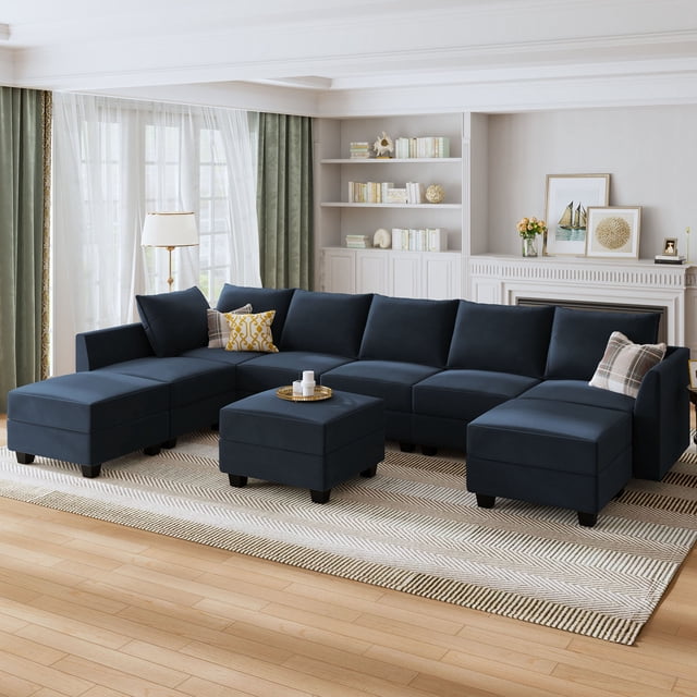 HONBAY Canapé Sectionnel Modulaire Moderne pour Salon avec Ottomans de Rangement, Bleu Marine. un Canapé Sectionnel en U Polyvalent au design Modulaire, Rembourré en Tissu de Velours Bleu Marine. Comprend des Assises et des Ottomans de Rangement Configurables, Idéal pour s'Adapter à Diverses Aménagements. Exposé dans un Salon Lumineux avec des Planchers en Bois, de Grandes Fenêtres et des Étagères Intégrées.