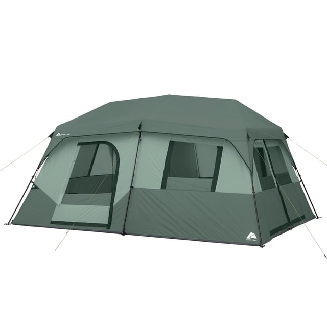 Ozark Trail 10-Person Instant Cabin Tent front-facing view of a 14' x 10' x 78" (H) cabin-style tent with instant setup via pre-attached poles, two doors, removable room divider, eight mesh windows, adjustable ground vent and electrical port; fits two queen airbeds and often used as a backyard or festival basecamp.