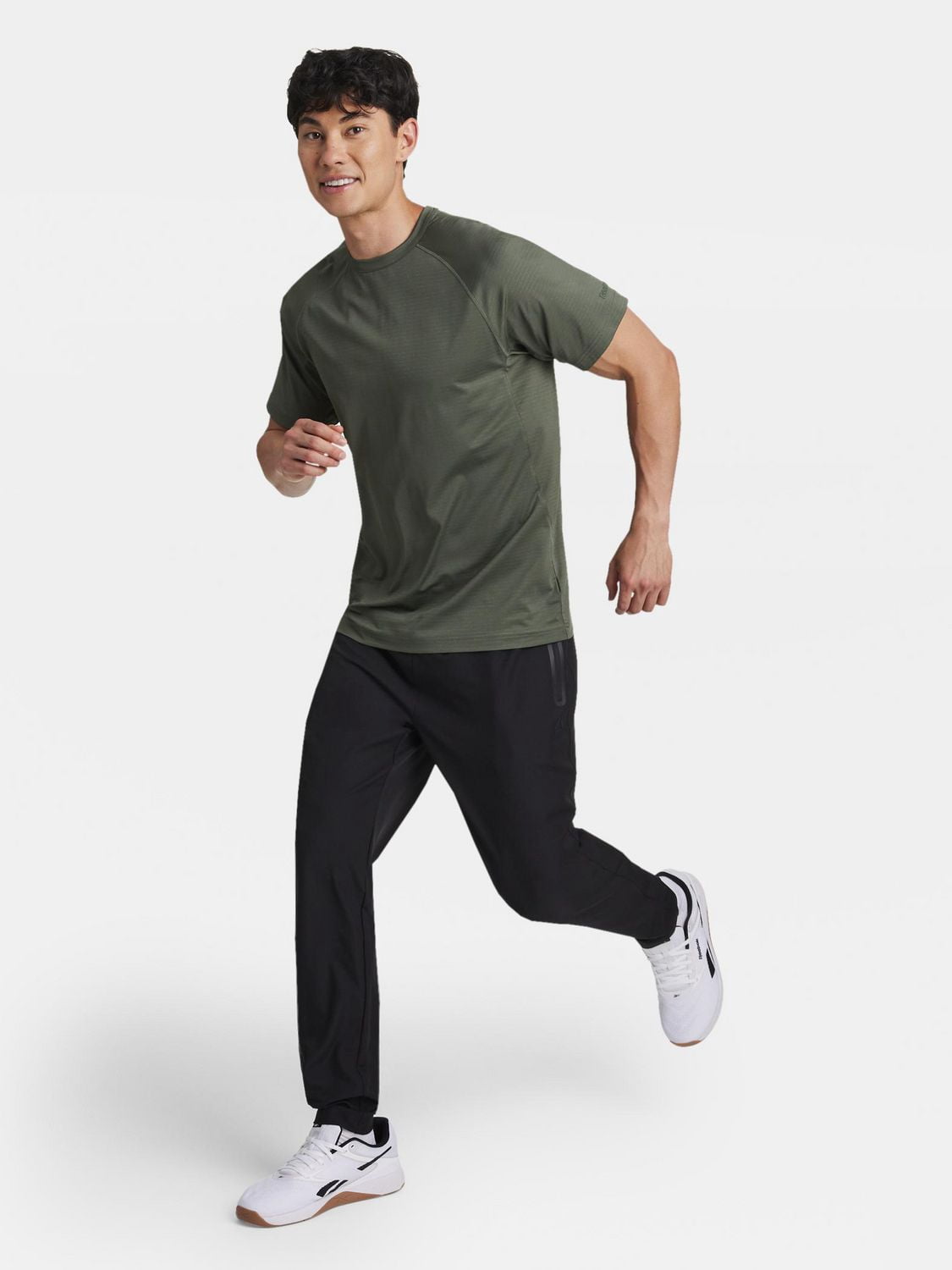 Reebok Pantalon fuselé tissé urbain pour homme