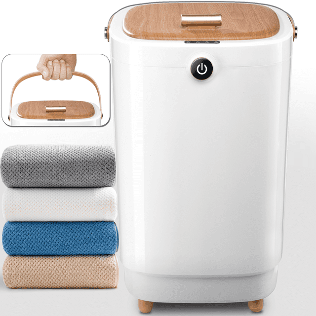 Towel Warmer for Bathroom, 22L Hot Towel Warmer Bucket with a sleek white body and wood-textured lid, featuring a carrying handle for portability. The warmer fits up to four 40"x80" oversized bathrobes or towels, shown alongside neatly folded towels in grey, white, blue, and beige. Equipped with a power button on the front, it offers 4 timer settings and automatic shut-off for safety. Ideal for home bathrooms, spas, or hotel use.