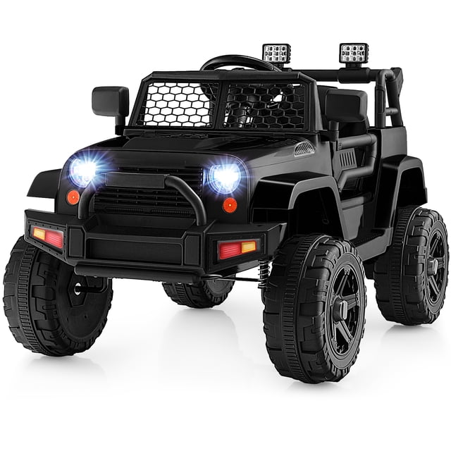 Gymax 12V Kids Ride On Truck Car Electric Vehicle Remote w/ Music & Light Black. A black powered ride-on truck with bright headlights, honeycombed windshield, and durable anti-slip wheels with spring suspension. Designed for children aged 3-7 years, it features manual and remote control options, a seat belt, and door locks for enhanced safety. Includes USB and Aux ports for music playback, slow start functionality, and smooth driving. Perfect for outdoor play and exploration.