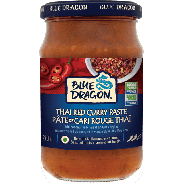 Blue Dragon Thai Red Curry Paste 270ml glass jar with a blue lid and label featuring the Blue Dragon logo, red chili peppers, and crushed chili flakes, containing a spicy Thai curry paste with no artificial flavours or colours, suitable for adding coconut milk, meat, or vegetables to create authentic Asian dishes.